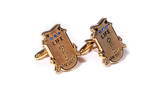 Golden PBS Gold Stone Life Member Cuff Links with blue gemstones, symbolizing elegance, heritage, and fraternity pride.