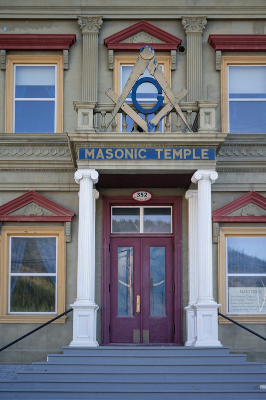 The image shows the entrance of a masonic temple