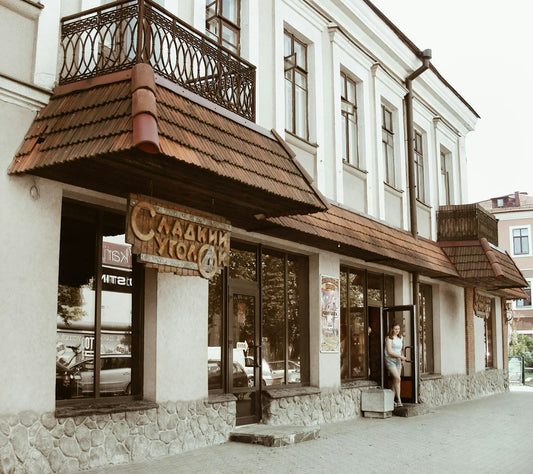 Building with a sign that reads sweet corner